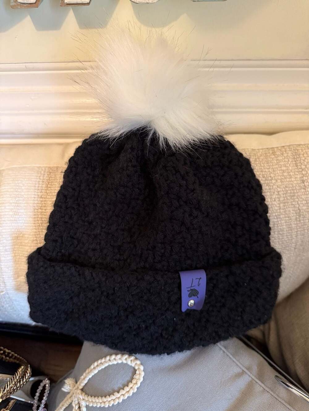 Handmade Black Crochet Knit Beanie with White Faux Fur Pom Pom and Purple Tag